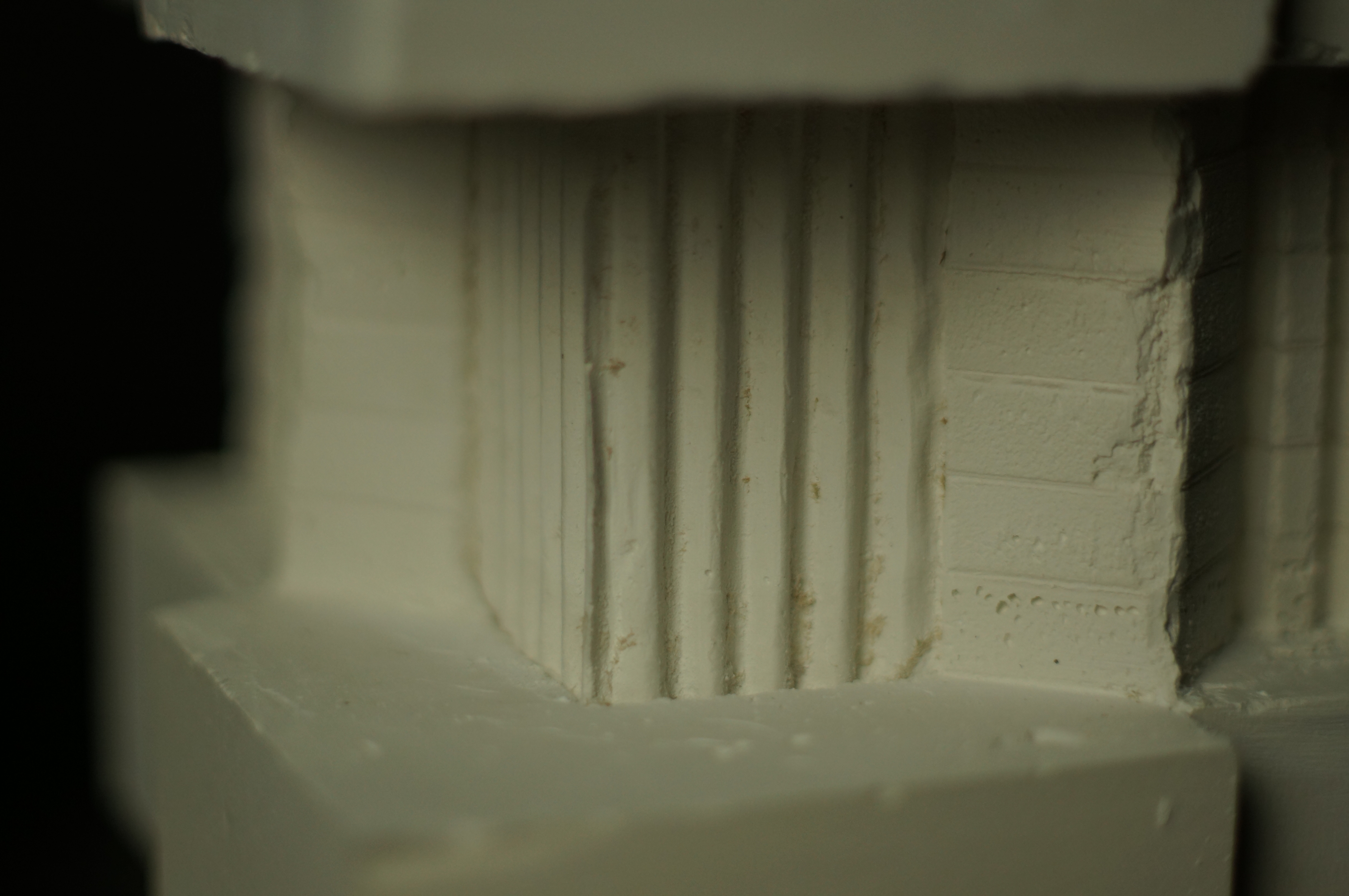 Close view of texture and negative space cast into plaster