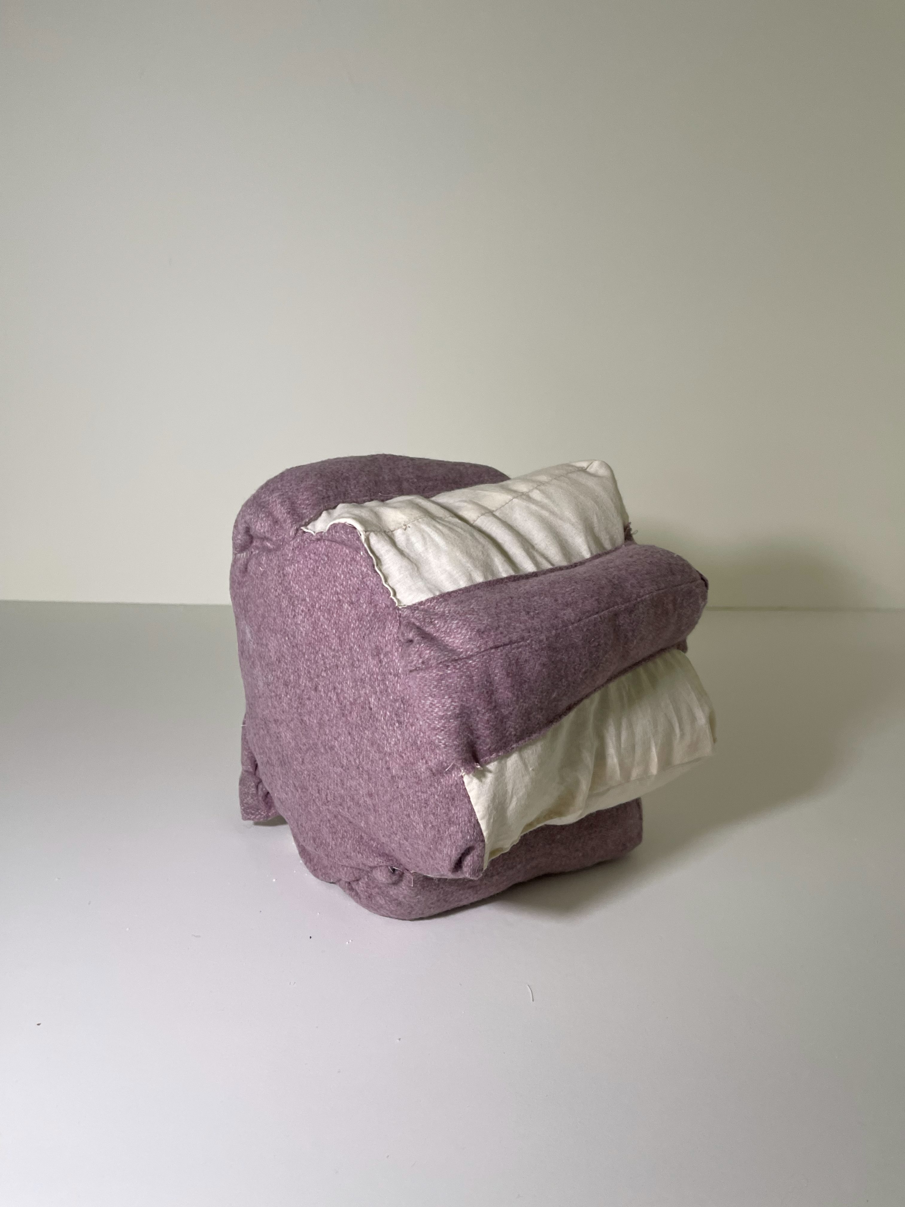Angled view showing overlapping soft forms